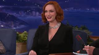 Christina Hendricks busty & fist bump!?  VIDEO LOOP!