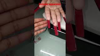 X-Long Red Bottom nails • Black gel polish