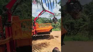 crawler dumper with crane grabber in test