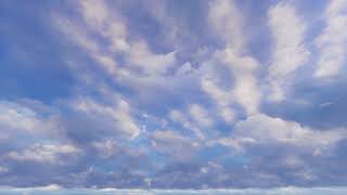 ( CGI 4k Stock Footage ) Heavenly beautiful fluffy white faith clouds blue seamless loop 6