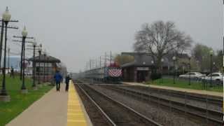 HD: Metra inbound races 75 minute late Amtrak California Zephyr with Heritage unit. Westmont IL.