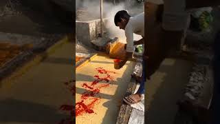 making of jaggery from sugarcane succulent.