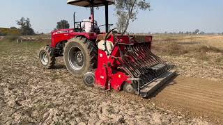 Massey 254 with super seeder