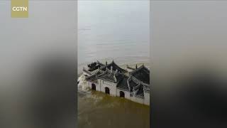 700 year old Chinese pavilion withstands Yangtze River flood