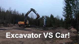 Excavator Lifts Car