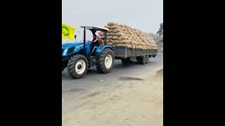 New Holland 6510 4wd with trolley