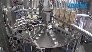 TREPKO   ROTARY MACHINES FOR FILLING AND CLOSING PRE FORMED CONTAINERS