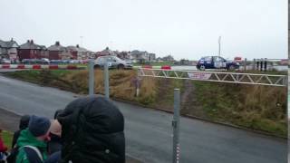 Chris Phillips in a Peugeot 106 GTi followed closely by Mathew Roberts in a Citroen Saxo