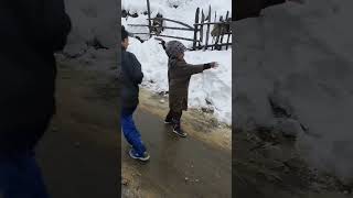 Kids enjoying seasons first snow fall. #kashmir #nature #kashmirheaven