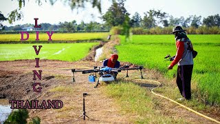 HUGE DRONE IN RICE FIELD IN THAILAND