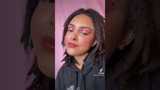 Pink and red graphic eyeliner makeup look