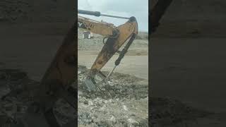 Excavator climbs