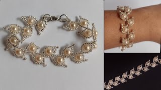 Pulseira folhas de pérolas e miçangas @Micangasbyjanaina @recantoolibar @canaldajann6834