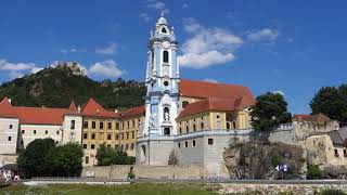 View from river cruise approaching Durnstein Abbey in Durnstein, Austria