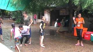 Cambodians Play in the Rain