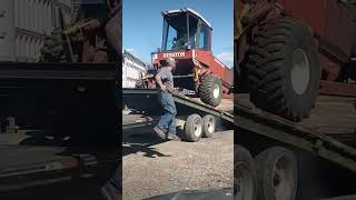 Loading a 9.5ft swather on an 8.5ft trailer. # why women live longer than men 🤣🤣🤣