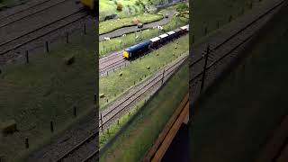 Some trains running on a model railway at Yeovil railway centre