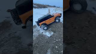 Rc car drives up a very steep gravel pile #shorts #traxxas #rccar #trx4 #fordbronco