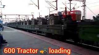 Indian freight train is carrying 600 tractors today. Indian Maal Gadi Maal Gadi.