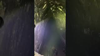 a bunch of teen boys singing Hallelujah whilst asserting dominance in a cave