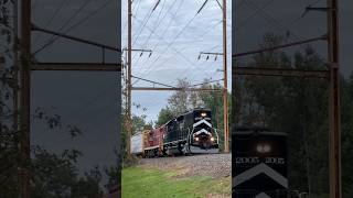 Simons Pond ripples as Delaware & Raritan River #Railroad #freight #train rolls in Shrewsbury, NJ.