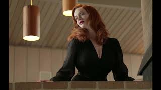 Christina Hendricks seductive sigh in busty black dress!  VIDEO LOOP!