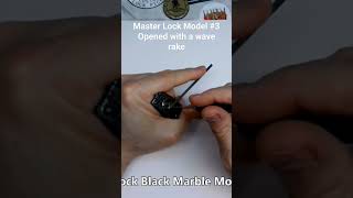 Black Marble Master Lock Model #3 opened with a wave rake