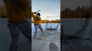 Hitting two frozen baseballs 78 MPH