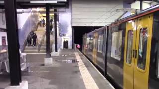 Tyne and Metro Cars No. 4039 and 4033 depart North Shields.