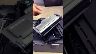 How to remove toner from Brother HL L2321D cartridge drum