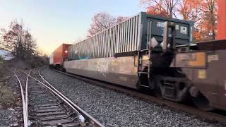 CSX 884 ES44AH leads CSX I032 at Piscataway