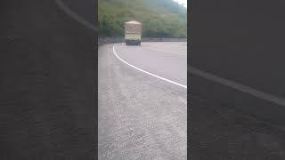 Truck going through sharp slopes with winding turns