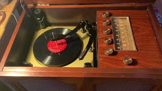 Ca. 1960 Magnavox console with a Collaro turntable playing The first LP "The Voice Of Frank Sinatra"