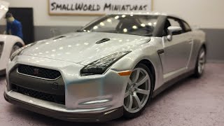 R$ 390,00Miniatura Nissan GT-R R35 2009 Bburago 1:18 Gold Branco PérolaMiniatura em metal com partes