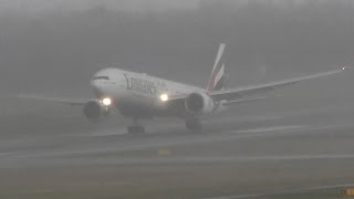 Boeing 777-300ER Emirates Crosswind landing during bad weather at Düsseldorf International Airport