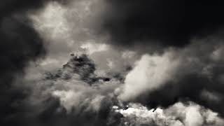 ( CGI 4k Stock Footage ) Dark film noir clouds seemless loop 0