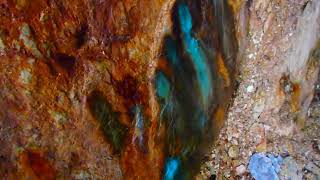 ACID CAVE ,Old Gold Mine leaching Sulfides/Sulphuric Acid,COPPER flowing out with the acid is BLUE