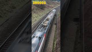 390001 flies through the curves at Forton, south of Lancaster