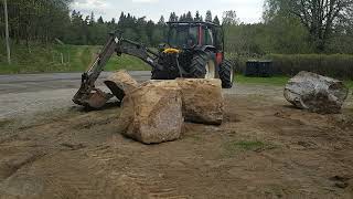 Valmet 30 and Valmet 6800 twin trac handles large stones