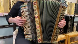 Demonstration of antique custom made bayan.