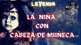 La NIÑA  con CABEZA de MUÑECA