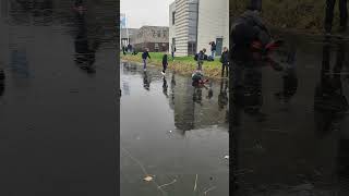 How children celebrate in frozen canal in the Netherlands