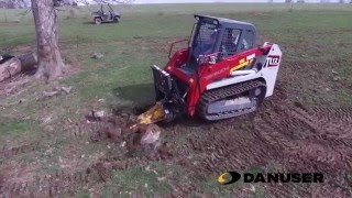 Danuser Intimidator on Takeuchi Skid-Steer Picking Rocks From Cattle Pasture