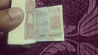 Two rupees notes bundle in UNC Condition ,value 2000-2500.