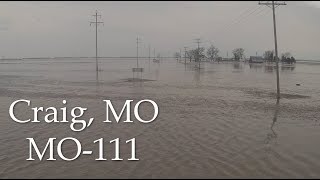 Water Rising Home Underwater Nearly Topping Man-Made levee on MO-111- Craig, MO