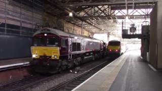 Belmond Royal Scotsman Liveried 66743 drags "The Royal Scotsman" into Edinburgh Waverley.