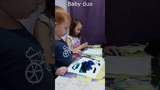 Сhildren paint with colors with music about the rainbow