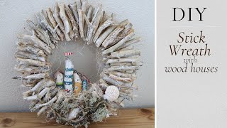 DIY Stick Wreath with Little Wooden Houses