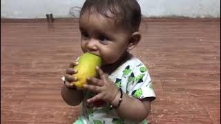 6 month old girl ate mango.