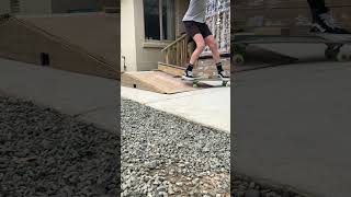 BACKSIDE BOARDSLIDE (on A frame rail)